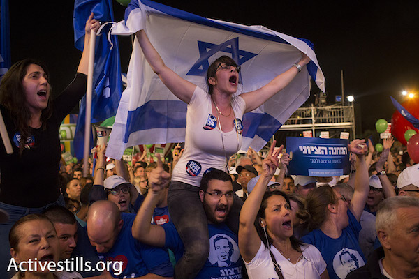 Supporters of Labor and Tzipi Livni’s ‘Zionist Camp’ at a rally calling to oust Prime Minister Netanyahu, Rabin Square, Tel Aviv, March 7, 2015. (Photo by Oren Ziv/Activestills.org)