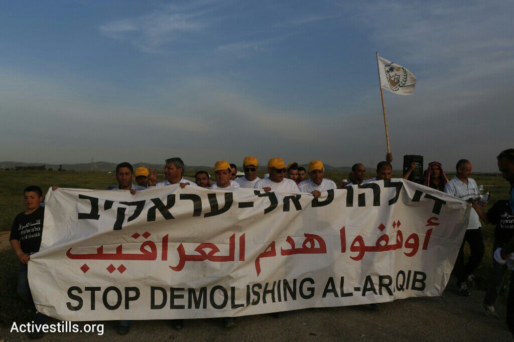 Villagers from the unrecognized village Al-Araqib march with dozens of others during a four-day march across the Negev desert, March 26. (photo: Oren Ziv/Activestills.org)