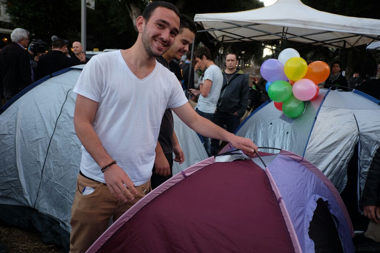 Activists re-establish the protest tent on Rothschild Boulevard, three years after the 2011 social protest movement, Tel Aviv, March 1, 2015. (photo: Oren Ziv/Activestills.org) 
