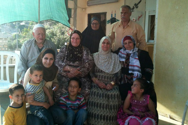 The Ruweidi family outside their home in Silwan May 9, 2012 (Photo: Moriel Zecher-Rothman)