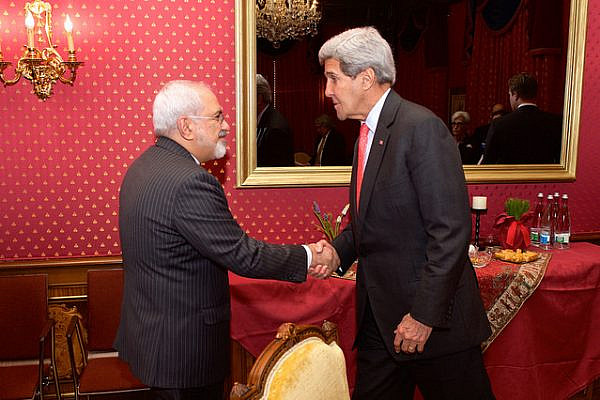 U.S. Secretary of State John Kerry greets Iranian Foreign Minister Javad Zarif on March 20, 2015, in Lausanne, Switzerland, before their advisers resumed negotiations about the future of Iran's nuclear program. (State Department photo)