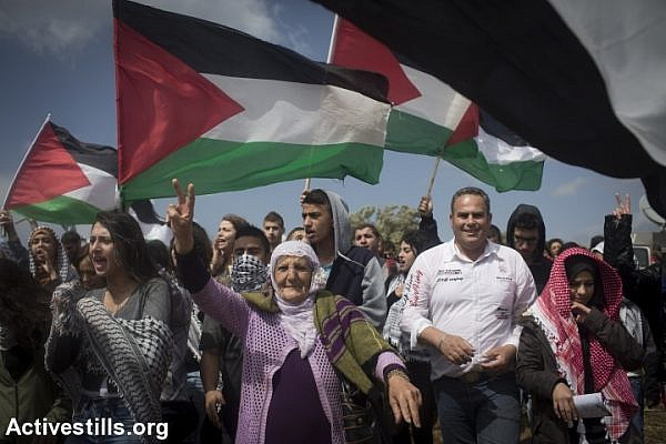 Thousands of Palestinian citizens of Israel take part in the March of Return, in the lands of the destroyed village of Hadatha, near Tiberias, April 23, 2015. (photo: Omar Sameer/Activestills.org)
