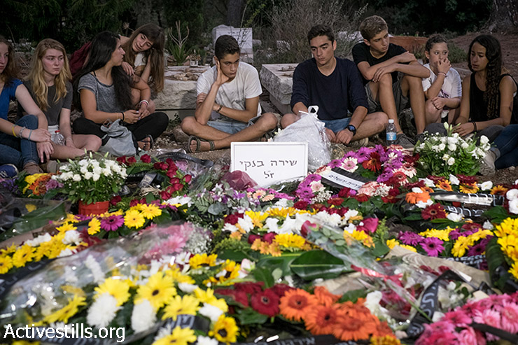 Hundreds of friends, classmates, teachers and members of the LBTGQ community participate in the funeral of Shira Banki, in Kibbutz Nachshon, August 3, 2015. Shira Banki, 16, was stabbed at the Jerusalem Gay Pride Parade on July 30, 2015, by a suspect identified as an ultra-Orthodox Jew released from prison only weeks prior the attack. Shira later died of her injuries. Six another marchers were stabbed at the Parade and are still recovering. (Activestills.org)