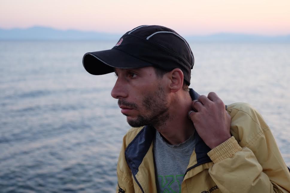 A Syrian refugee gets off a boat at Kos, Greece. The rest of his family stayed behind in Syria, September 9, 2015. (Oren Ziv/Activestiils.org)