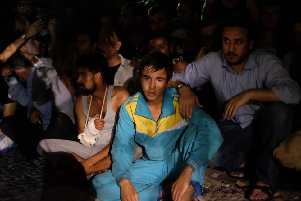 Syrian refugees wait for interviews outside the Kos police station, September 9, 2015. (photo: Irene Nasser)