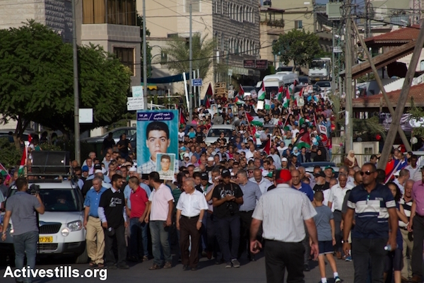 Palestinian citizens of Israel march to commemorate the killing of 13 protesters by Israeli police in October 2000, Sakhnin, October 1, 2015. (Omar Sameer/Activestills.org)