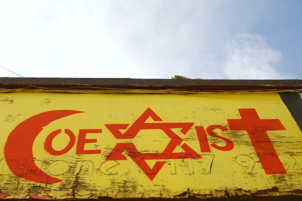 Coexist (Photo by 1000 Words / Shutterstock.com)