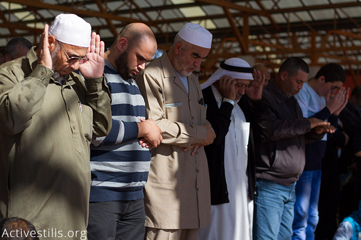 Raed Salah, the leader of the northern wing of the Islamic Movement in Israel, takes part in a protest against the Israeli government's decision to outlaw the movement, in the Palestinian-Israeli town of Umm al-Faham, on November 20, 2015. (Activestills.org)
