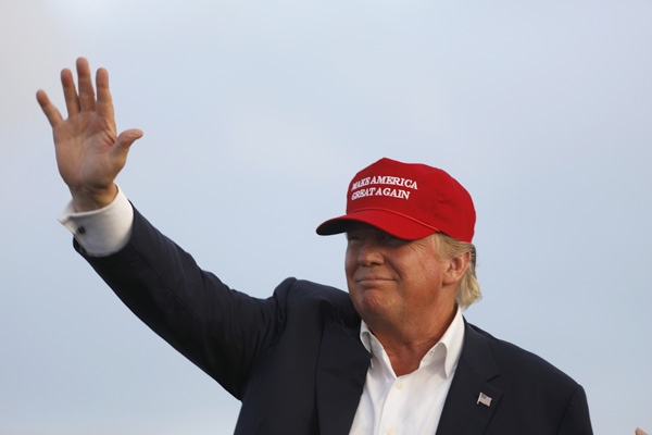 Donald Trump waves during a campaign rally in Los Angeles, September 15, 2015. (Joseph Sohm / Shutterstock.com)