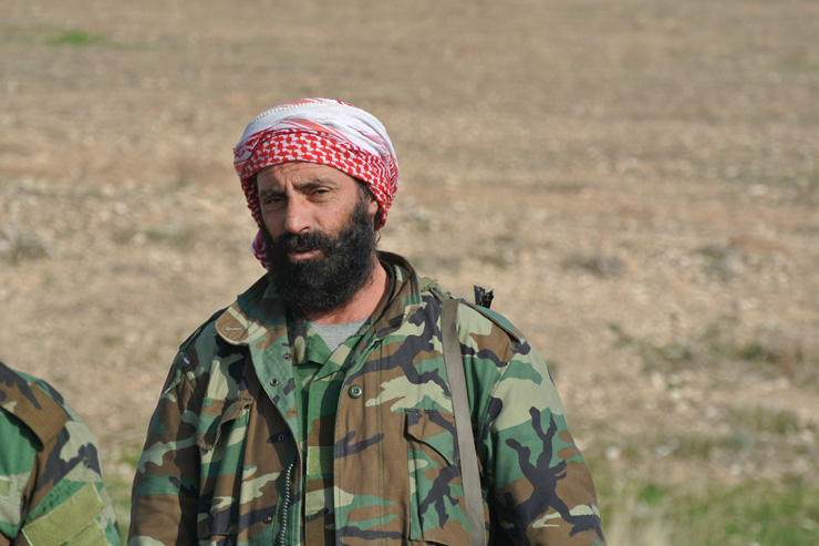 A Yazidi man shoulders an AK-47 near the frontline with ISIS east of Shingal, Iraqi Kurdistan. (Seth J. Frantzman)
