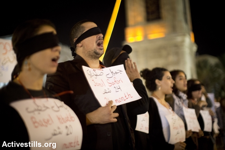 Palestinians citizens of Israel shout slogans during a protest against the Prawer-Begin plan, Jaffa, November 28, 2013. (Oren Ziv/Activestills.org)