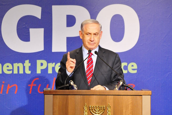 Prime Minister Benjamin Netanyahu speaks to reporters at a Government Press Office event, December 17, 2014. The GPO accredits journalists but is also considered a ‘hasbara,’ or propaganda branch of the government.(Roman Yanushevsky / Shutterstock.com)