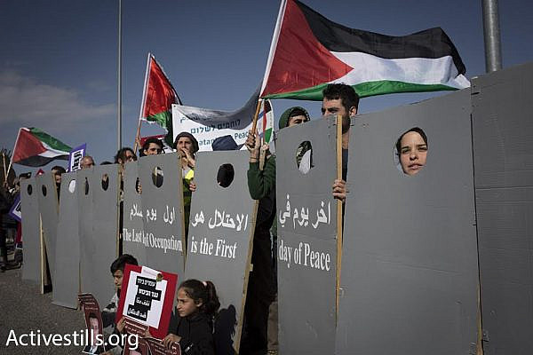 Israelis and Palestinians march toward the 'tunnels checkpoint' in the West Bank, in a joint demonstration against the occupation, February 5, 2016. (photo: Oren Ziv/Activestills.org)