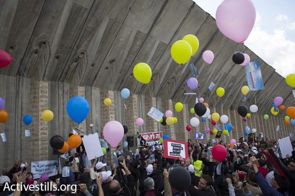 Palestinian and Israeli demonstrators release hundreds of balloons marking International Women's Day during a protest march against the occupation, Beit Jala, West Bank, March 4, 2016. (photo: Oren Ziv/Activestills.org)