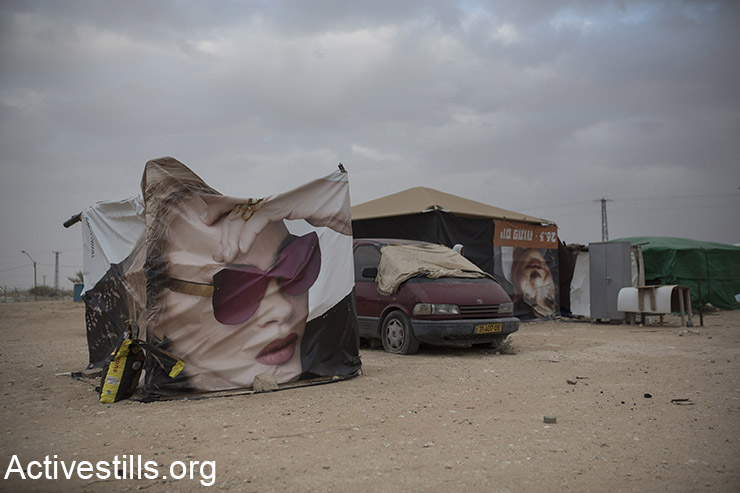 Make-shift restaurant outside Holot detention centre in the Negev desert, February 6, 2016. African asylum seekers jailed in Holot opened a few restaurants and bars outside the facility, as they say the food given to them is not sufficient and is of poor quality. (Activestills.org)