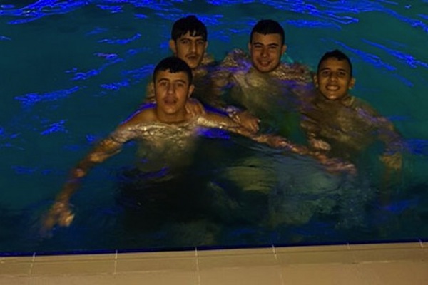 Mahmoud Badran (first on the right) hours before he was 'mistakenly' shot down by Israeli soldiers. (photo courtesy of B'Tselem)
