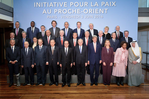 A photo of the foreign ministers and other participants at the Paris peace summit, June 3, 2016. (EU Photo)
