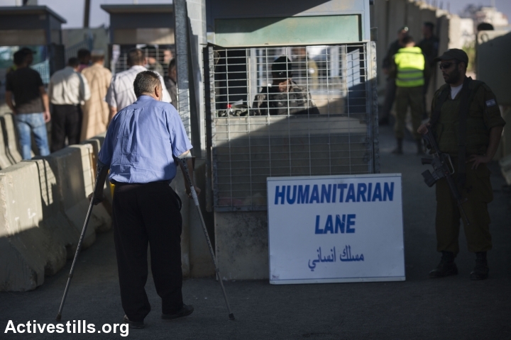 A Palestinian man crosses Qalandiya checkpoint, a main crossing point between Jerusalem and the West Bank city of Ramallah, as they head to Jerusalem's Al-Aqsa mosque for the first Friday prayer of the holy Muslim month of Ramadan, June 10, 2016. (photo: Oren Ziv/Activestills.org)