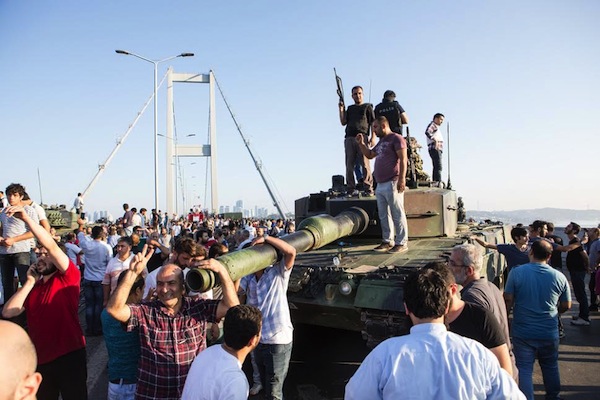 Supporters of the attempted military coup in Turkey seen standing atop a tank in Istanbul, July 16, 2016. (photo: Deepspace / Shutterstock.com)