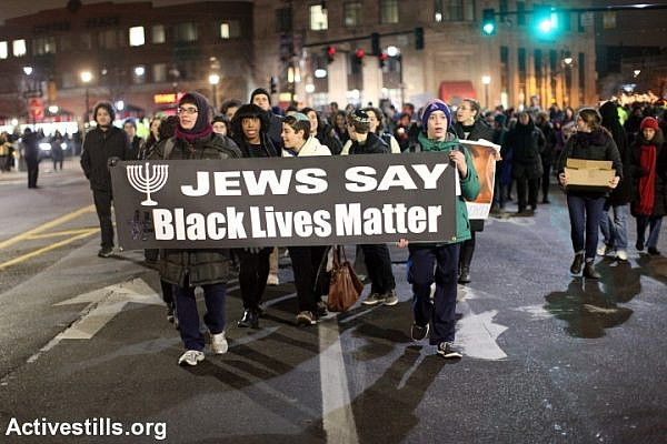 Jewish activists take part in a Black Lives Matter protest in Brookline, MA, December 16, 2014. (Tess Scheflan/Activestills.org)