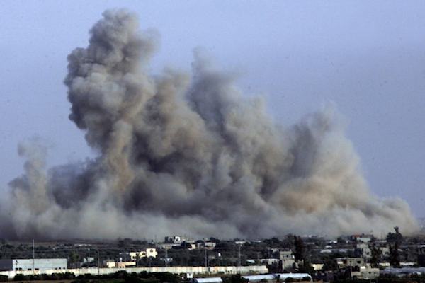 Smoke from an Israeli air strike in Rafah, southern Gaza Strip, July 12, 2014. (Abed Rahim Khatib/Flash90)