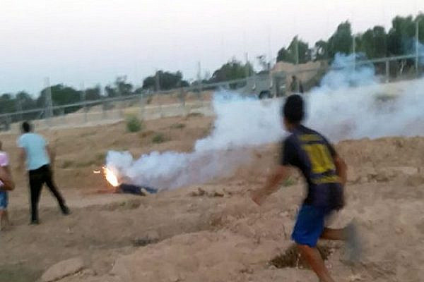 A military illumination flare burning the face of Abdel-Rahman al-Dabbagh, which killed him, Gaza Border, September 9, 2016. (Screenshot, DCI-Palestine)