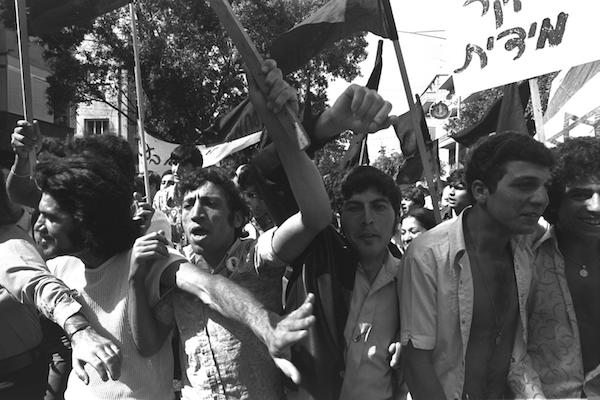 Israeli Black Panthers, including Charlie Biton, protesting on Dizengoff Street in Tel Aviv, May 1, 1973. (Moshe Milner/GPO)