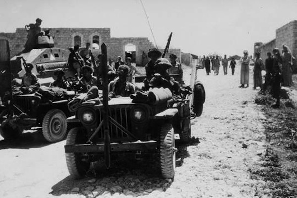 Israeli soldiers seen in Kafr Qasim in 1948. (GPO)