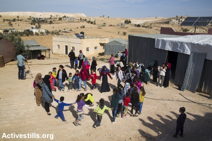 aChildren in the unrecognized village of Umm el-Hiran do a dance once it became clear that the demolition would not take place on Tuesday, Umm el-Hiran, the Negev, November 22, 2016. (Keren Manor/Activestills.org)