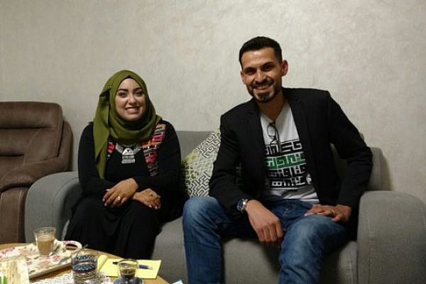 Anas Abudaabes and his wife, Ruqayya Sabah, in their home in Rahat, November 30, 2016. (Orly Noy)