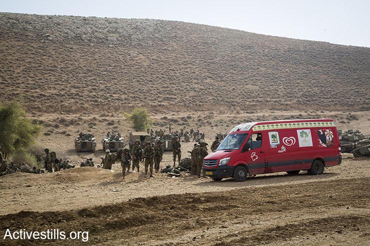 An ice cream truck parks in the IDF open-fire zone, Jordan Valley, West Bank, December 8, 2016. (Keren Manor/Activestills.org)