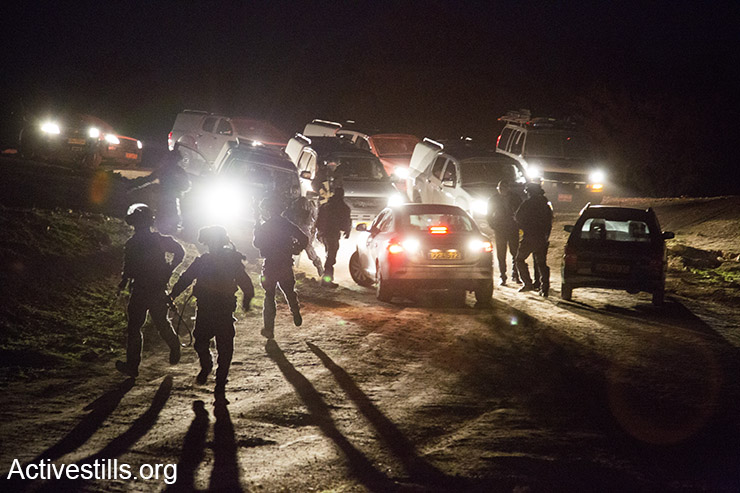 Hundreds of Israeli police officers arrived in Umm el-Hiran at around 5.30am, running towards the mosque where residents and activists had gathered, ahead of planned demolitions in the unrecognized village. Shortly after a few rounds of live fire were heard, followed by a burst of shots and shouts that people had been killed. (Keren Manor/Activestills)