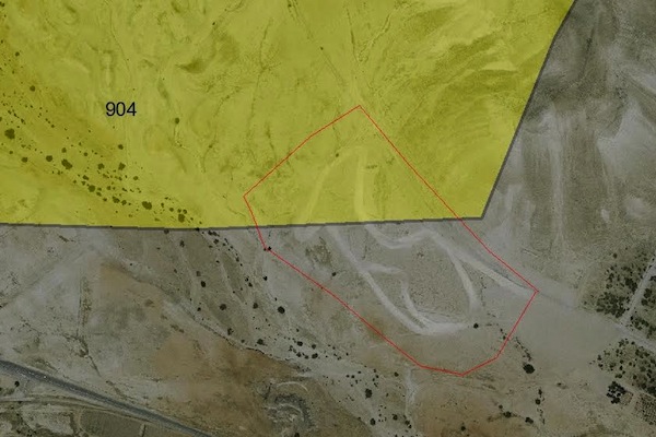 An aerial photograph of the rallycross track built in Firing Zone 904 in the West Bank. The red line marks the approximate area of the fence surrounding the track. (Dror Etkes)