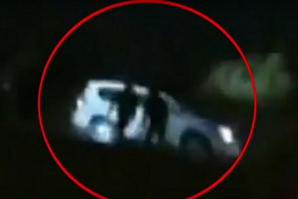 Screenshot of Al Jazeera footage showing that Yaqub Abu al-Qi’an was driving with his headlights on when police shot him.