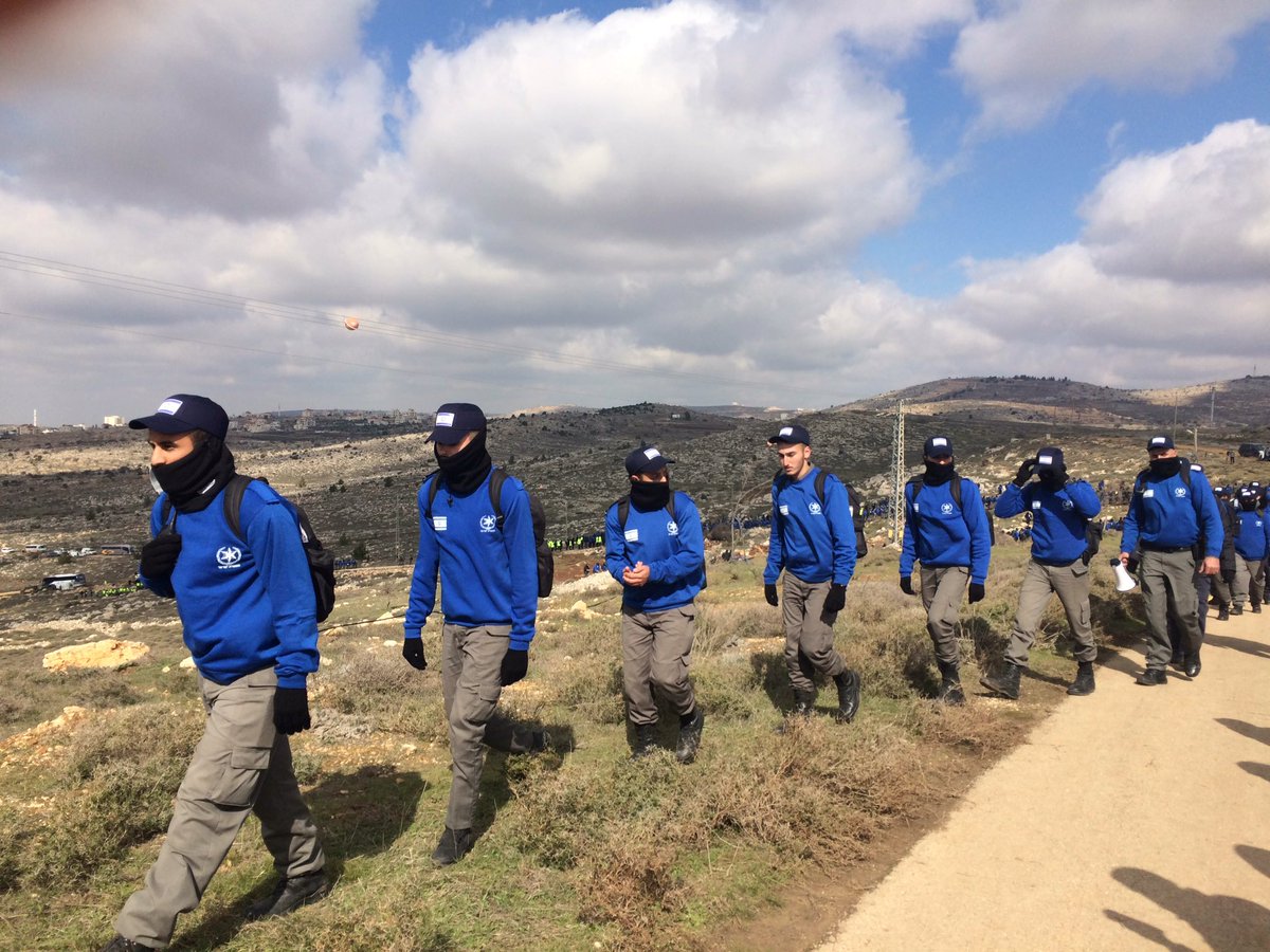 Israeli police arrive in the West Bank outpost of Amona unarmed. (Tovah Lazaroff)