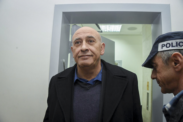 Joint List MK Basel Ghattas is brought to court for a remand on his arrest at the Rishon Lezion Magistrate's Court, December 27, 2016. (Yair Sagi/Flash90)