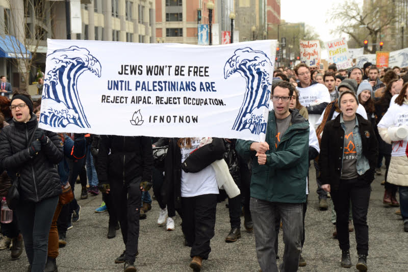 Activist from IfNotNow march outside the Washington Convention Center to protest the annual AIPAC Policy Conference, Washington D.C., March 26, 2017. (Gili Getz)