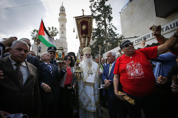 Orthodox Christians participate in a Holy Fire ceremony at the Church of the Nativity in the West Bank city of Bethlehem during the Easter Holiday, April 15, 2017. (Wisam Hashlamoun/Flash90)