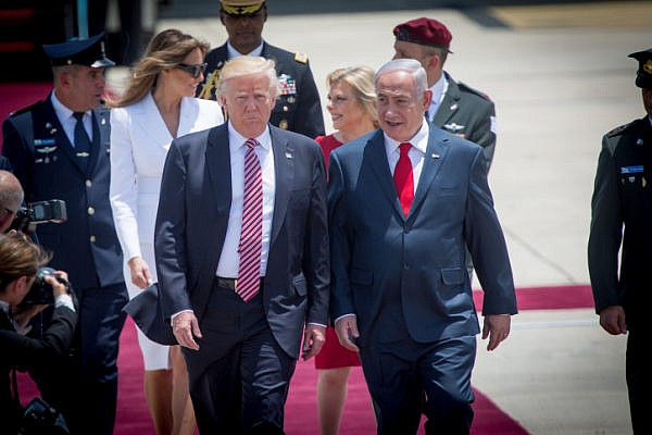 President Donald Trump walks alongside Prime Minister Benjamin Netanyahu at a ceremony the president, as he arrives at Ben Gurion Airport, May 22, 2017. (Miriam Alster/Flash90)