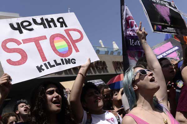 People protest outside the Russian Embassy in Tel Aviv calling to stop the persecution of the gay community in Chechnya, May 5, 2017. (Tomer Neuberg/Flash90)