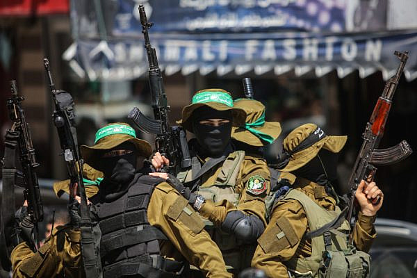 Masked gunmen from the Qassam brigade, the armed wing of Hamas, attend the funeral of Mazen Faqha in Gaza City, Saturday, March, 25, 2017. (Wissam Nassar/Flash90)
