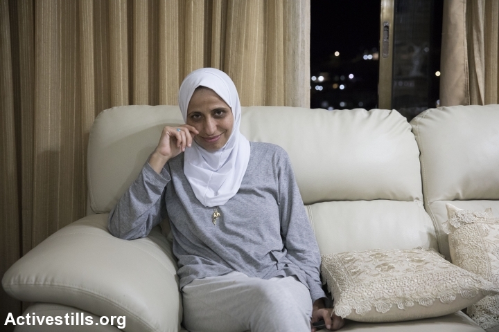 Daren Tatour is seen in her home in the town of Reineh, near Nazareth, August 23, 2017. (Oren Ziv/Activestills.org)