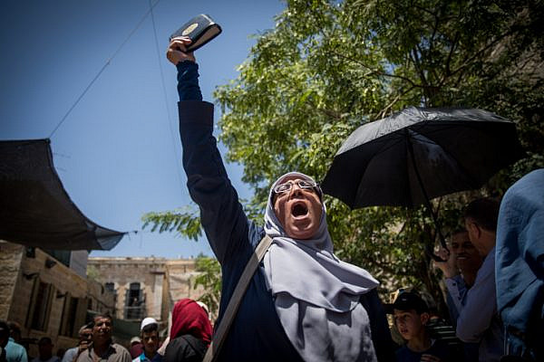 Muslim women protest in front of the Lion's Gate entrance to the Temple Mount, in Jerusalem's Old City, after metal detectors were placed ahead of its opening, July 16, 2017. (Yonatan Sindel/Flash90)