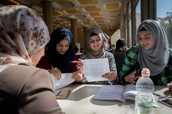 Palestinian women sit and study together at Hebrew University. (Nati Shohat/Flash90)
