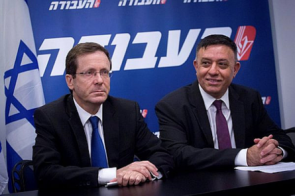 Newly elected head of the Israeli Labour party, Avi Gabbay, with outgoing Chairman Isaac Herzog. (Miriam Alster/ FLASH90)