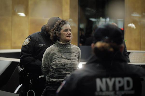 A member of Jewish Voice for Peace is arrested during a protest action at the Anti-Defamation League's offices in New York, November 9, 2017. (Courtesy of JVP)
