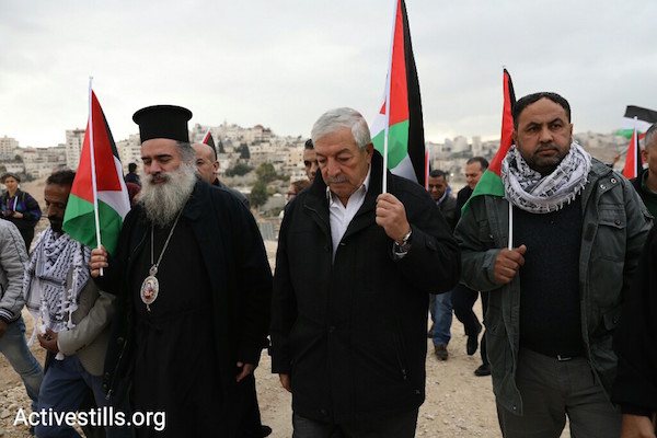 Representatives of the Palestinian Authority and Bishop Atallah Hanna from the Greek Orthodox Church took part in the protest by residents of Jabal al Baba against their expulsion. November 23, 2017 (Oren Ziv/Activestills)
