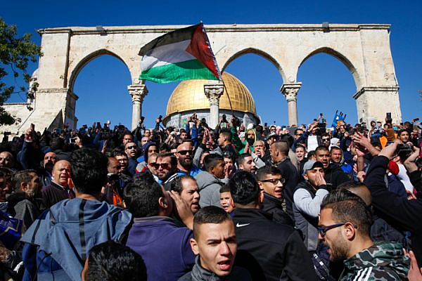 Palestinians shout slogans during a protest against U.S. President Donald Trump's announcement recognizing Jerusalem as the capital of Israel, following Friday prayers at the Al Aqsa compound in Jerusalem's Old City, December 8, 2017. (Sliman Khader/Flash90)