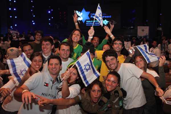 Young Jews participating in the Taglit Birthright program at an event held at the International Conference Center in Jerusalem. (Marc Israel Sellem/Flash90)