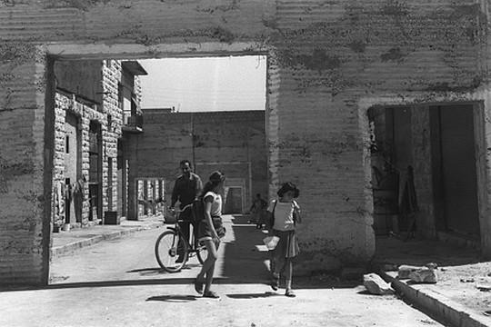 Mizrahim walk around the Mamila neighborhood in West Jerusalem, 1957. Mamila, like countless other neighborhoods and communities, was empied of its Palestinian residents in the 1948 war. (GPO)